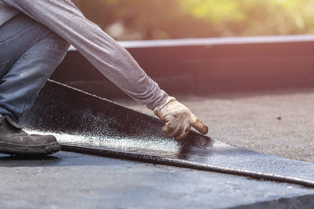 Professional Basement Waterproofing technician working in Deerfield, MI